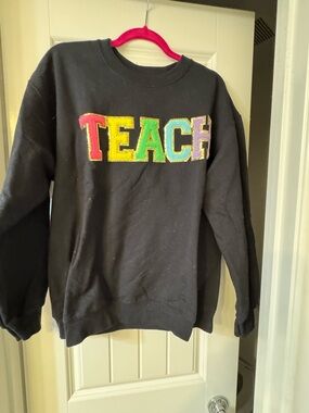 Black Sweatshirt with Colorful TEACH Letters